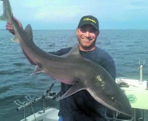 Gawaine Blake with a big gummy shark taken on a chunk bait.