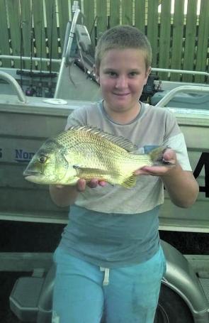 Young Nick Kenny with a cracking bream from the Burnett River.