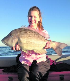 Lana with a very classy sweetlip caught on the drift out near Jew Shoal.