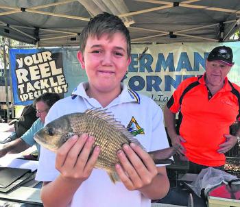 Casey Bates weighed in the first live fish for the competition on Friday – an awesome 542g bream.