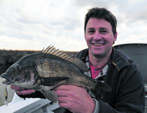 Owen Pierce takes advantage of an overcast early morning, shallow water bream session. Fishing lures can be at its best during late summer.