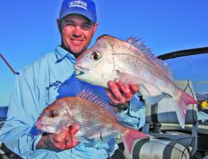 The author was stoked with his double header of snapper. The larger specimen ate a surf popper. Surf poppers bob around effectively at depth and need not be baited – convenient!