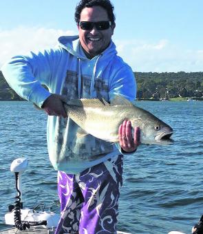 Local angler Rob Depares with a Lake Macquarie mulloway plucked from under a school of feeding tailor. This one fell to a blade.