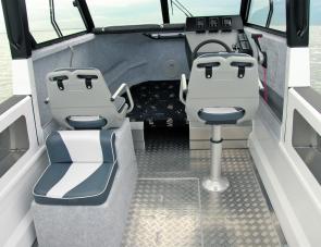 The Super Cab offers a very clean and uncluttered forward area for maximum comfort of those aboard. The big side pockets nearly start at the seating. 