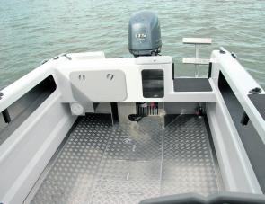 The ample cockpit and wash out tread plate floor are key fishing features. 