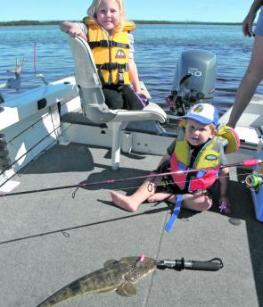 Flathead fishing on the Passage is child’s play! And the big kids don't mind it either.
