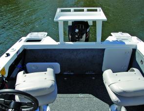 The boat as tested had large recirculating livewell, a handy bait station, plus a set of tackle trays. Note the high sides and full height transom.