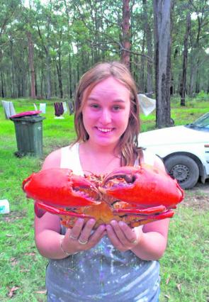 Sarah Ashley with a huge mud crab taken in a local backwater. March is a great month for big crabs full of meat 