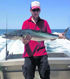 Adam Baker with a Spanish mackerel caught while on a half-day fishing trip off Broome.