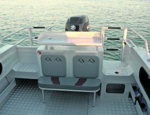 The small drop down rear seat can be easily shifted to allow access to the Fisherman’s bait station. 
