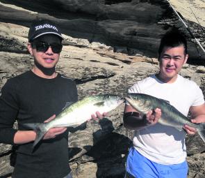 Tim Nguyen and Eric Trung with a 56cm tailor and a 65cm salmon.