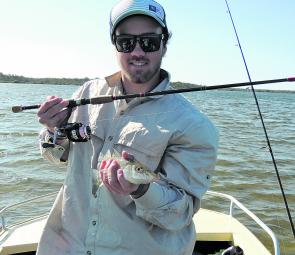 Kieran Lancini with a 33cm whiting from the shallows.