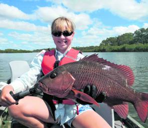 Young Jessie Vincent subdued this 54cm mangrove jack on a live mullet using 2-4kg spin gear.