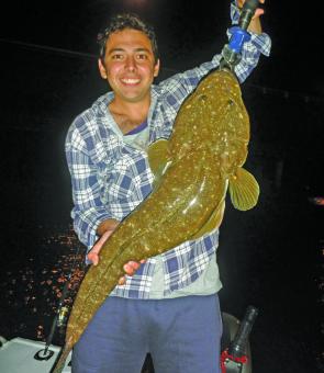 Nathan Halliday and his brother Scott booked a night charter and were rewarded with this 94cm flathead, caught on a live herring.