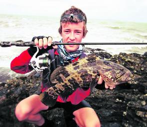 Connor from CQ Fishing and Boating with a nice cod taken on an Atomic Bream Shad.