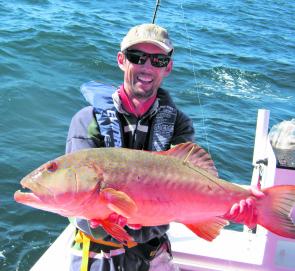 Nathan with a big coral trout caught while tagging in the green zones.