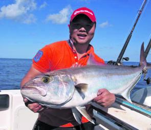 Peter Lam with a 20kg amberjack caught while jigging. 