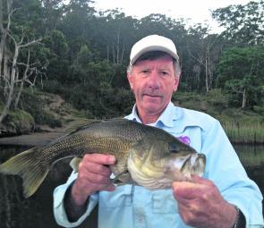 Gary Trotter with a 56cm horse of a Shoalhaven River bass that was released.