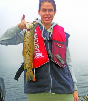 Sarah Coates with her first Lake Purrumbete trout – there are plenty here of this size. 