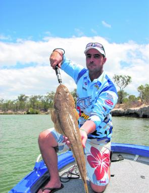 QFM area reporter Brad Dyson with a cracking flathead caught in the Gregory River on a Jackall Trans-Am fished deep.