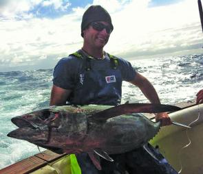 Tuna Club of Tasmania President Nobby Clark with a cracking 20kg plus albacore.