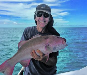 Quality coral trout, like this one caught by Ian Clarke, from Malanda, have been coming aboard off Cairns recently.