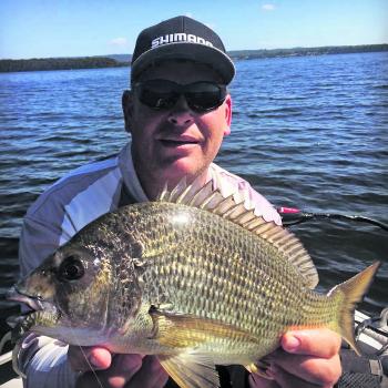 Jason Mayberry with a solid Basin bream caught casting into the shallows.