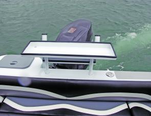 Live well to port, bait station central, OMM make the most of their wide transom. Note that the transom door is standard. 