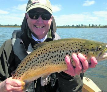 Jim Baimbridge with a lovely Lake Wendouree dunn feeding brown trout.
