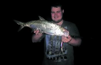 The author with a solid tarpon taken on a Lucky Craft Pointer 78XD at the hot water outlet.