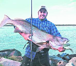 Local lure maker Steve Patti with a Clarence River mulloway taken on one of his more exotic creations, the Hybrid.