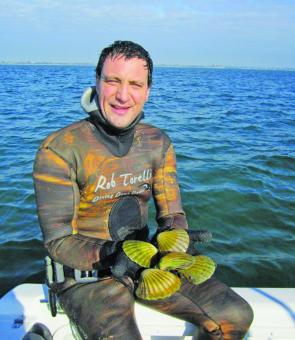 Jordan Hill and some large winter scallops.