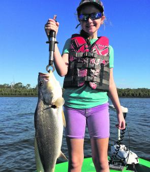 The author’s daughter with a fantastic mulloway taken from the river.