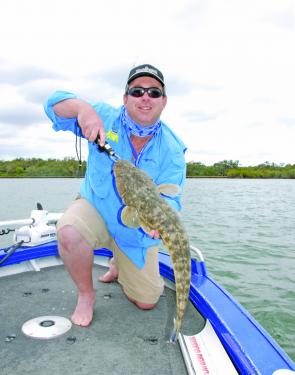 Shayne McKee with a great flatty trolled up in the 2010 Flathead Classic. This fish went a touch over 70cm and was landed on a Lively Lures Micro Mullet in green and black in only 3 feet of water.