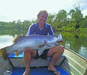 Paul struggled to bring this giant barra aboard his little tinny while fishing with Mitch at Pikes Crossing.