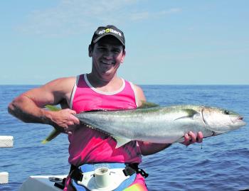 Damian with a great kingfish caught from Caloundra wide.