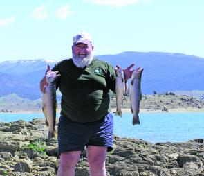 Adaminaby Fishing Club president John Bray with three lovely browns caught on a morning lake troll on a Lofty's Cobra. 