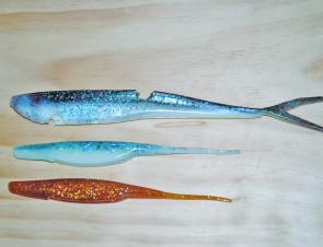 Profiling: A 10” Lunker City Fin-S Shad above two 7” Assassin straight tail shads (the middle lure in glo pilly colour and the lower lure in scented calamari colour. This selection of three lures offer; scent, glow in the dark and big profile options.
