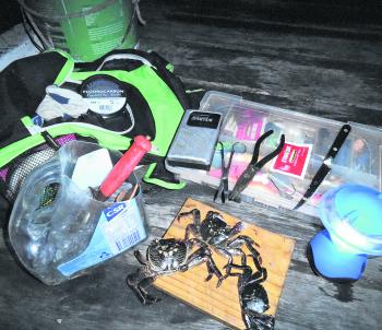 Everything you need for night bream fishing, including a radio and lamp. Red rock crabs are one of the best night baits for huge bream off wharves and rocks.