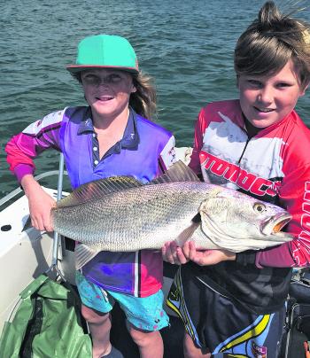 Bailey Williams with his buddy and a solid Middle Island mulloway.
