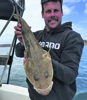 Mick Brittain with a lovely big flathead taken at Point Nepean.