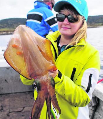 Clea with a run of the mill Tasmanian squid. 