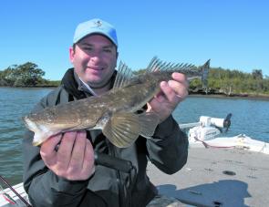 Aykut Ahmet with a flathead caught trolling a Micro Mullet.