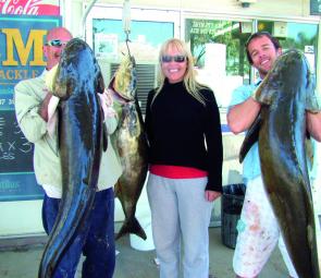 Chenye Sales (right) and his parents show off their three cobia caught in a recent session. They weighed 27kg, 24kg and a massive 35kg.