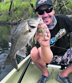 Greg Livingstone found time to land a bass or two from the back of the Duo while we were testing the craft.