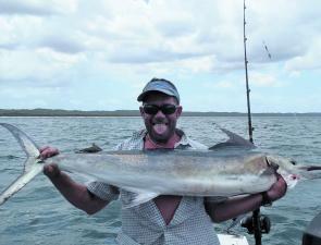 Sam Taylor with an average sized Hervey Bay black marlin.