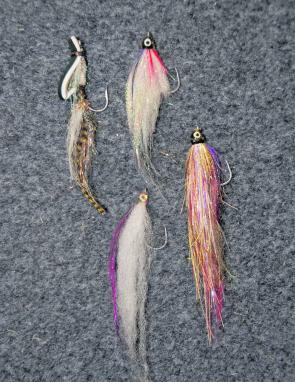 A selection of barra flies: the top fly is a Gartside Gurgler, the others are a few of the author’s favourite wet flies. 