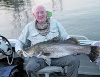 David Falconer shows the correct way to hold a big barra for a pic. 