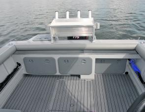 The OMM’s easily identified cockpit features include the attractive Sea Deck floor covering, gunwale coaming, large side pockets, an in floor fish box, bait station, live bait well to starboard, plus the transom’s off floor compartments. 