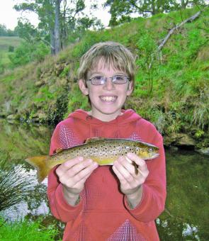 Jack Moon shows us how its done, showing off this lovely 38cm brown trout that he caught on worms.